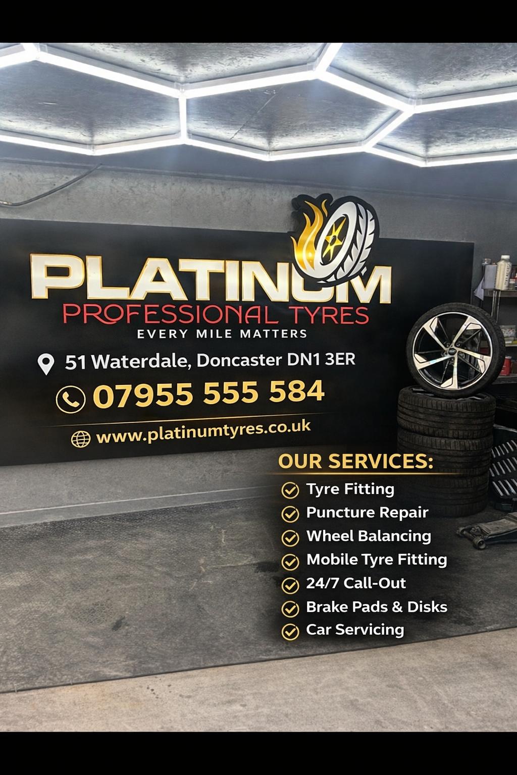 Mobile tyre fitting on a BMW at an industrial estate